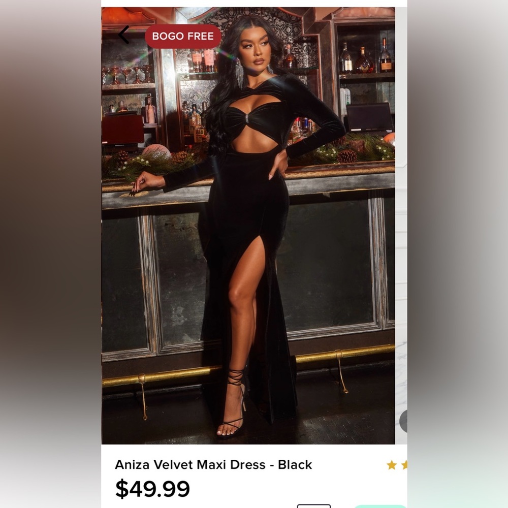 Like new black velvet dress. High slit, long sleeve, very flattering.